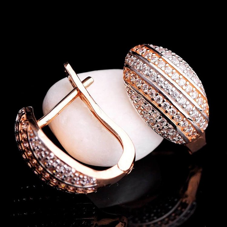 Золоті жіночі сережки з фіанітами с01920 від ювелірного магазину Онікс