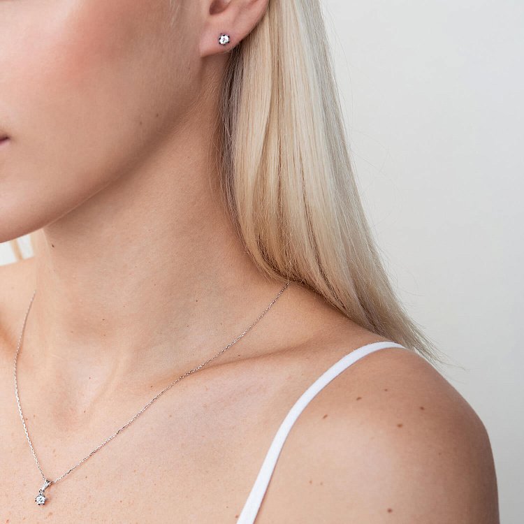 Золотые серьги - пусеты с фианитами с05849 от ювелирного магазина Оникс - 1