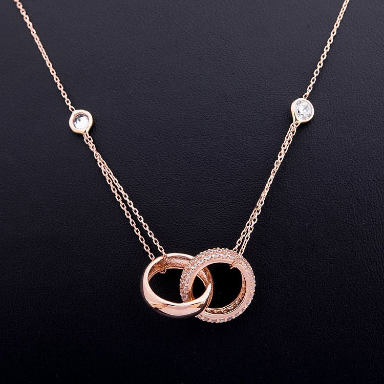 Золотое колье "Два обручальных кольца" с фианитами кол00731 от ювелирного магазина Оникс - 1