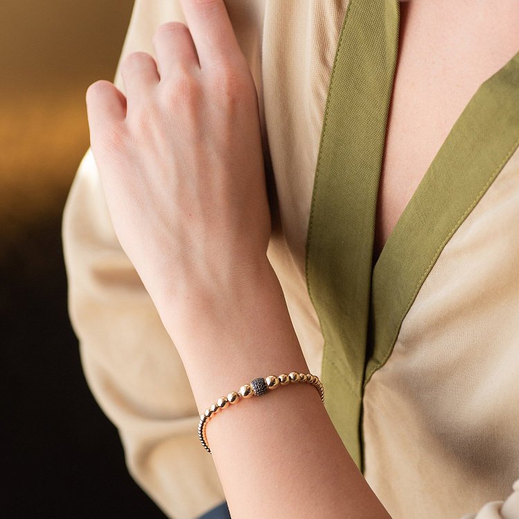 Браслет "Шарики" в желтом золоте (черные фианиты) б04651 от ювелирного магазина Оникс - 1