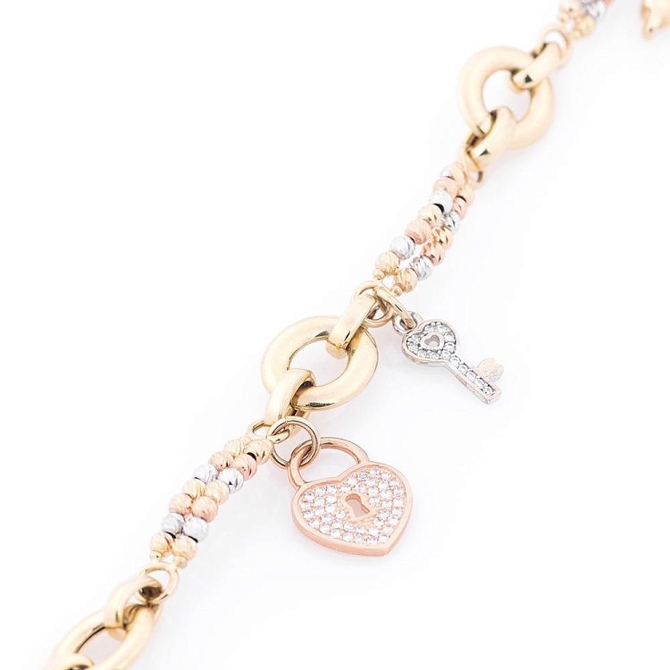 Золотой браслет "Сердце и ключик" (фианиты) б02379 от ювелирного магазина Оникс - 1