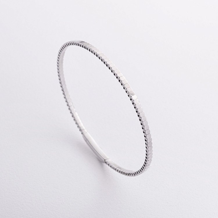 Жорсткий браслет "Kylie" у білому золоті б05571 від ювелірного магазину Онікс