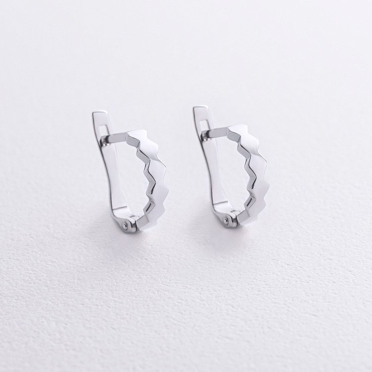 Сережки з білого золота на англійській застібці с06387 від ювелірного магазину Онікс