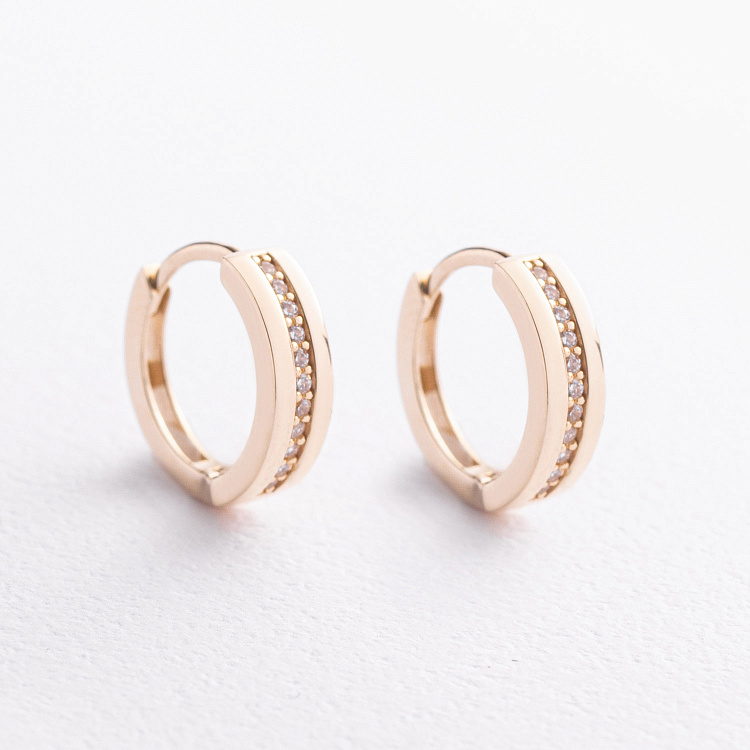 Сережки - кільця з фіанітами (жовте золото) с09706 від ювелірного магазину Онікс