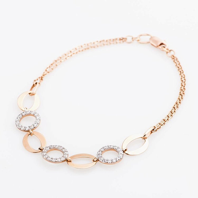 Золотой браслет "Кольца" с фианитами б01018 от ювелирного магазина Оникс