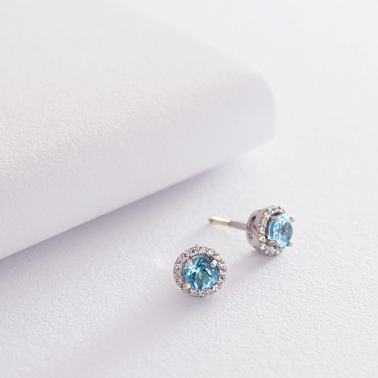 Золотые серьги-гвоздики с топазом и фианитами с489гт Золотые серьги-гвоздики с топазом и фианитами с489гт от ювелирного магазина Оникс