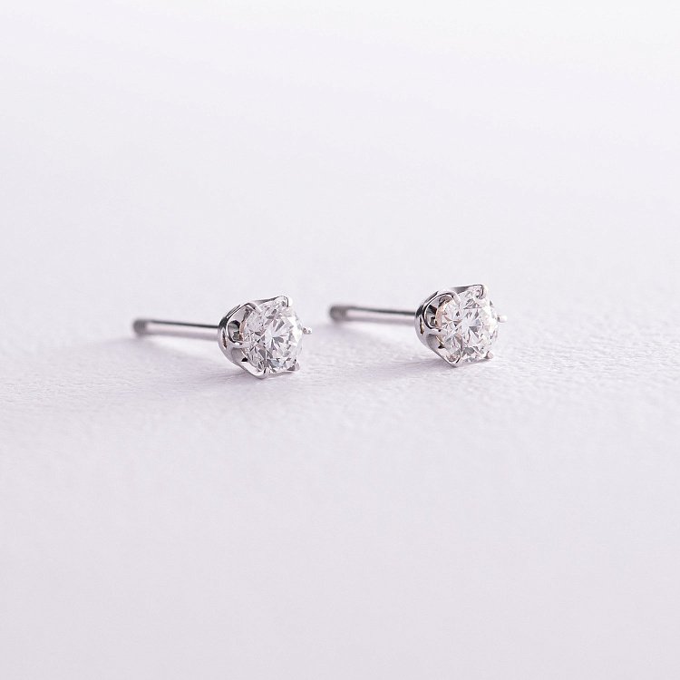 Золоті сережки - пусети з діамантами сб0392 від ювелірного магазину Онікс