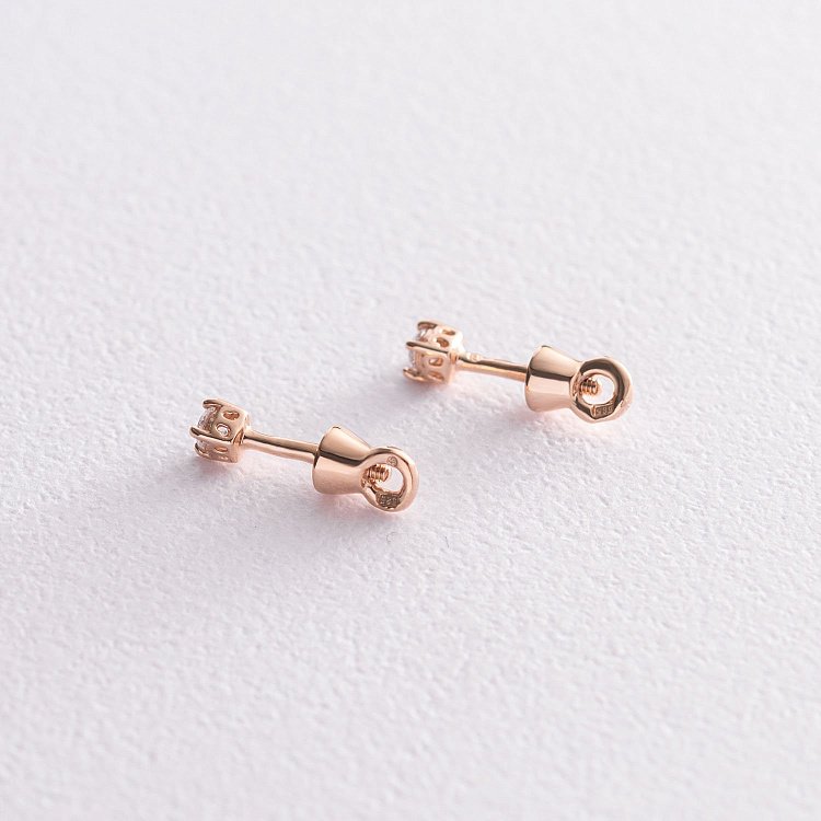 Золоті сережки-пусети з фіанітами 520279 від ювелірного магазину Онікс - 2