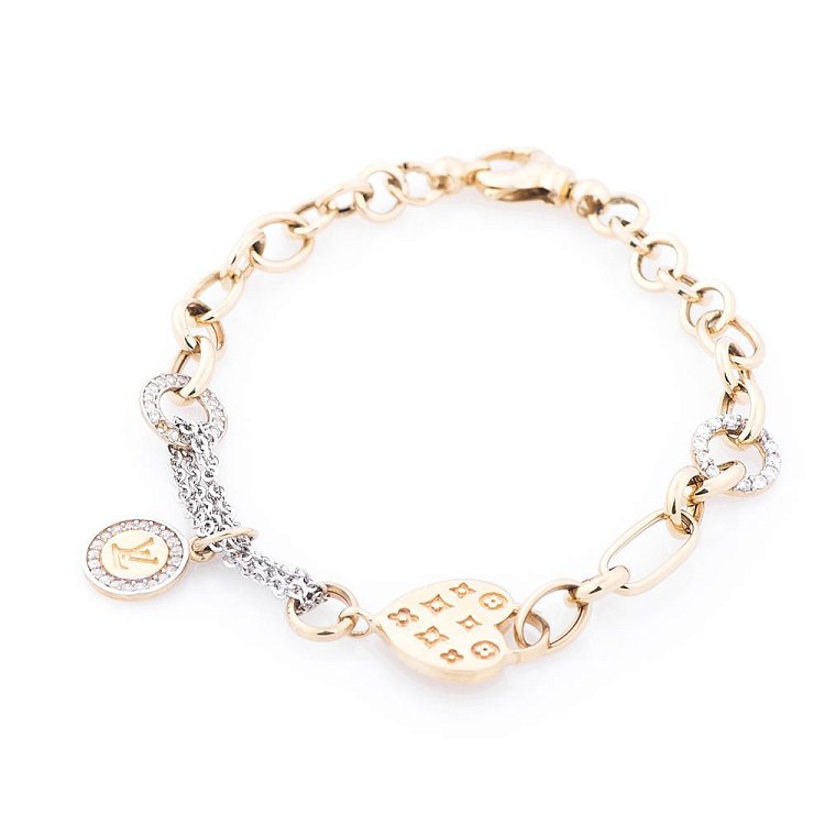 Золотий браслет "LV" (фіаніти) б02341 від ювелірного магазину Онікс