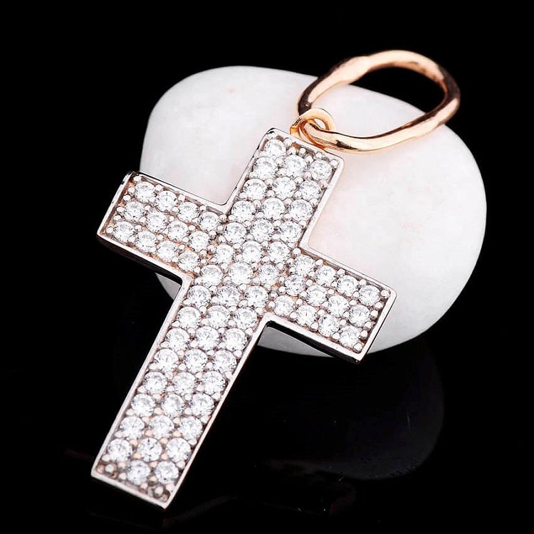 Золотой крестик с фианитами п01936 от ювелирного магазина Оникс