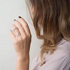 Срібний перстень з фіанітами 111869 от ювелирного магазина Оникс