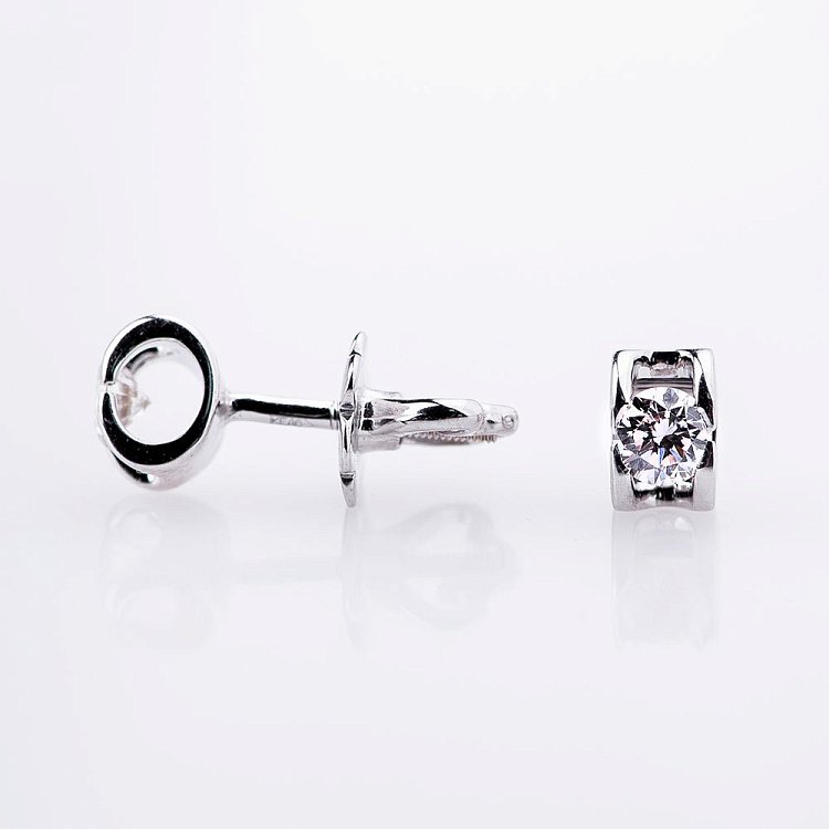 Золоті сережки-пусети з діамантами е0598б від ювелірного магазину Онікс