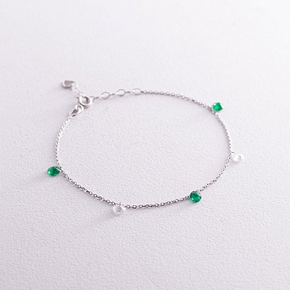 Браслет в белом золоте (зеленые и белые фианиты) б05136