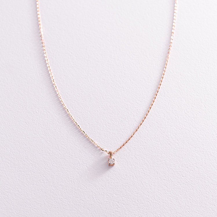 Золоте кольє з одним діамантом 104-10013 від ювелірного магазину Онікс