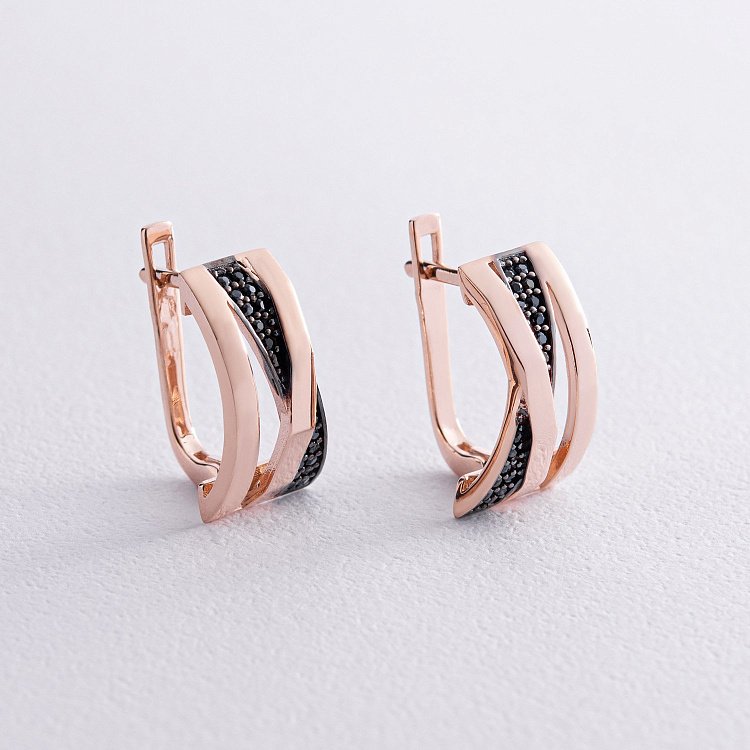 Золоті сережки з чорними фіанітами с07901 від ювелірного магазину Онікс