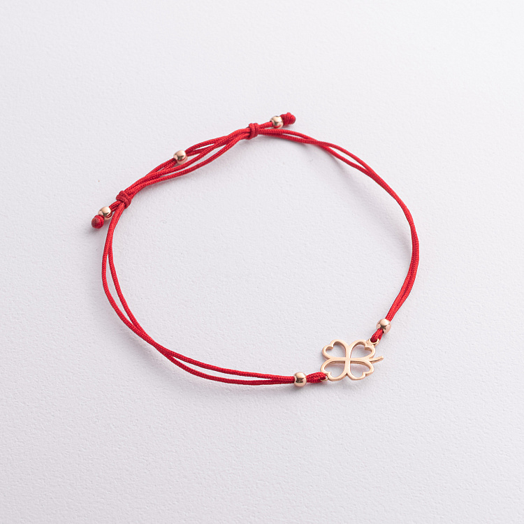 Золотий браслет "Конюшина" з червоною ниткою б05737 від ювелірного магазину Онікс
