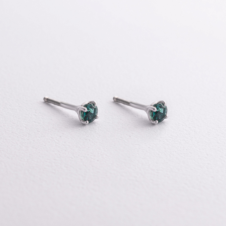 Срібні сережки - пусети з хризолітом 2494/1p-QGR від ювелірного магазину Онікс