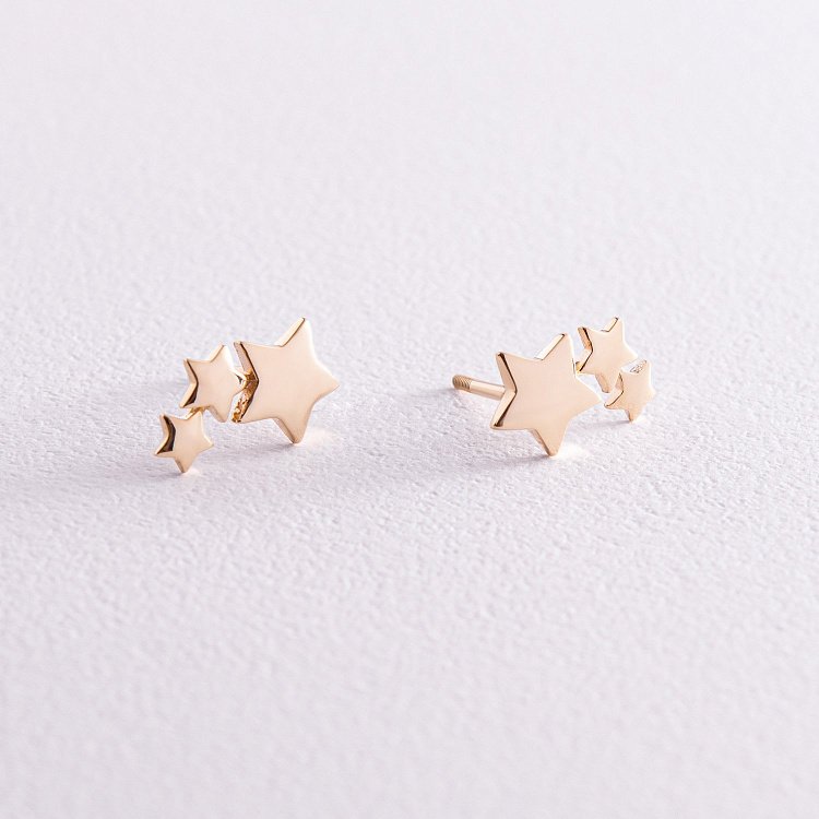 Серьги - пусеты "Звездочки" в желтом золоте с08032 от ювелирного магазина Оникс