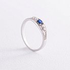 Золотое кольцо с синим сапфиром и бриллиантами C01021R от ювелирного магазина Оникс