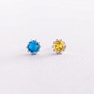 Срібні сережки - пусети (блакитне та жовте каміння) 308 от ювелирного магазина Оникс